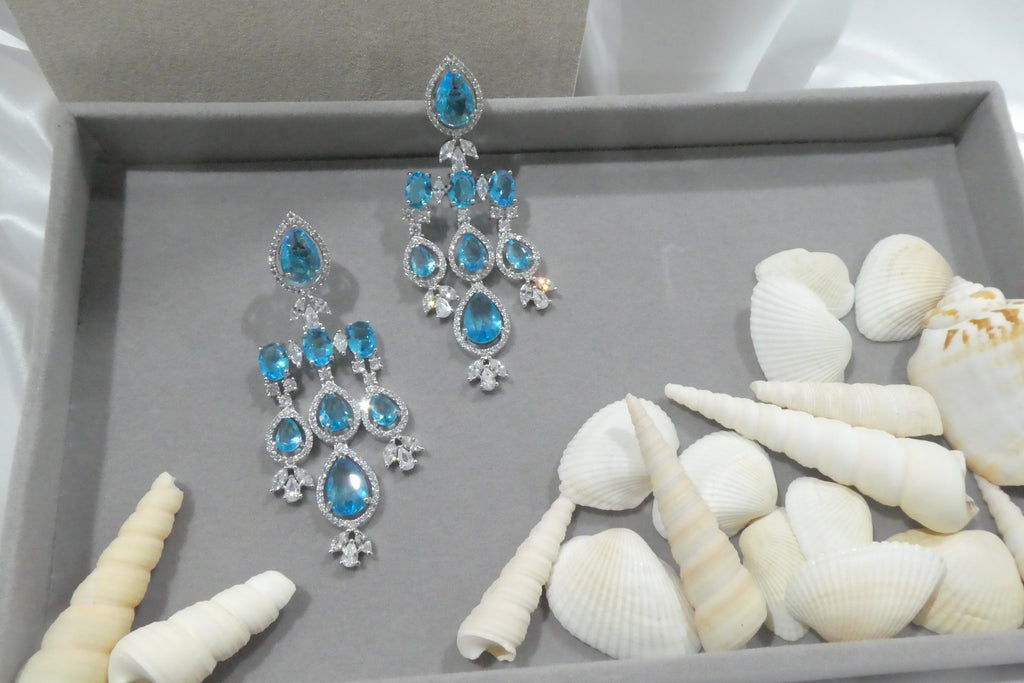 Azure Chandelier Earrings close-up in display box